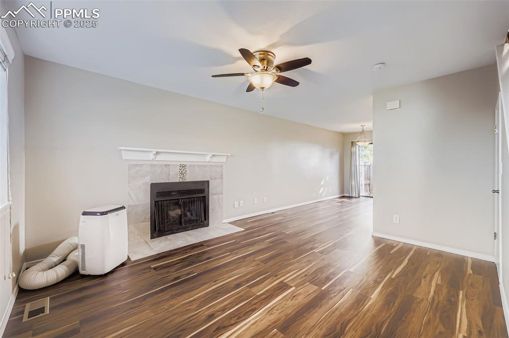 Image 5 of 24: Living Room and view of Dinning Area