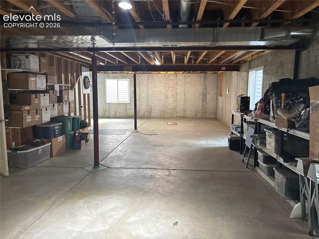 Image 16 of 23: The unfinished basement is perfect for storage needs or bring your design i