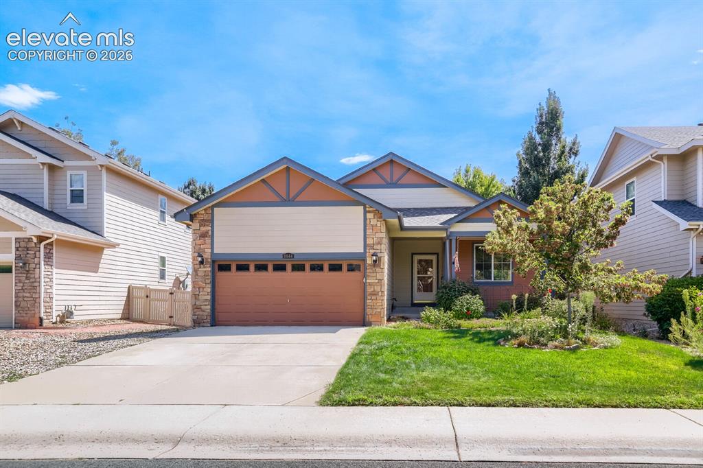 Image 17 of 23: Auto sprinkler system keeps your front yard looking fabulous!