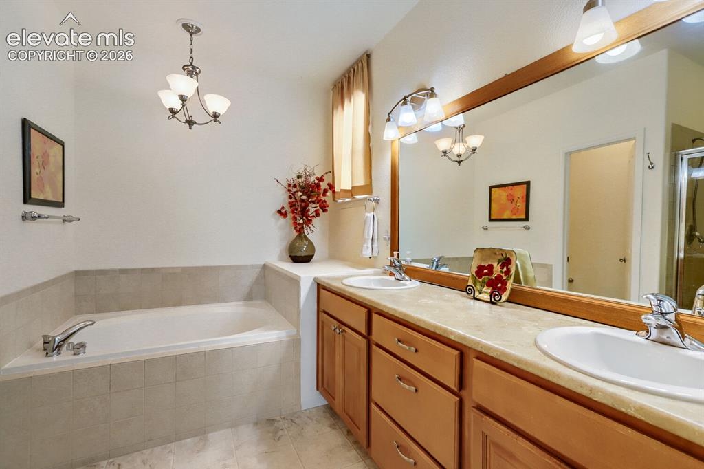 Image 9 of 23: 5 piece adjoining bathroom to include double sinks, soaking tub, separate s