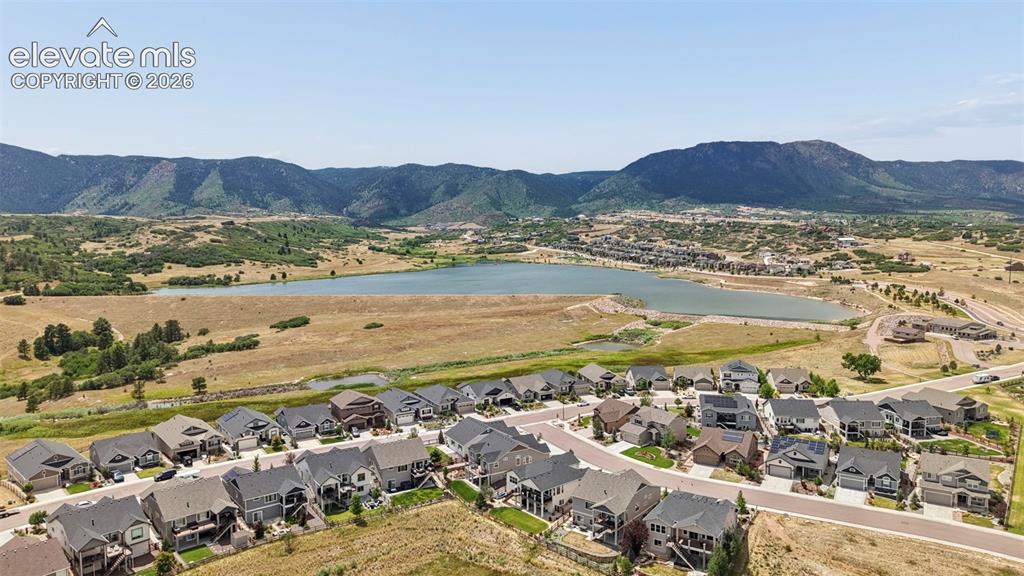 Image 32 of 37: Aerial perspective showcasing a residential community with varied architect