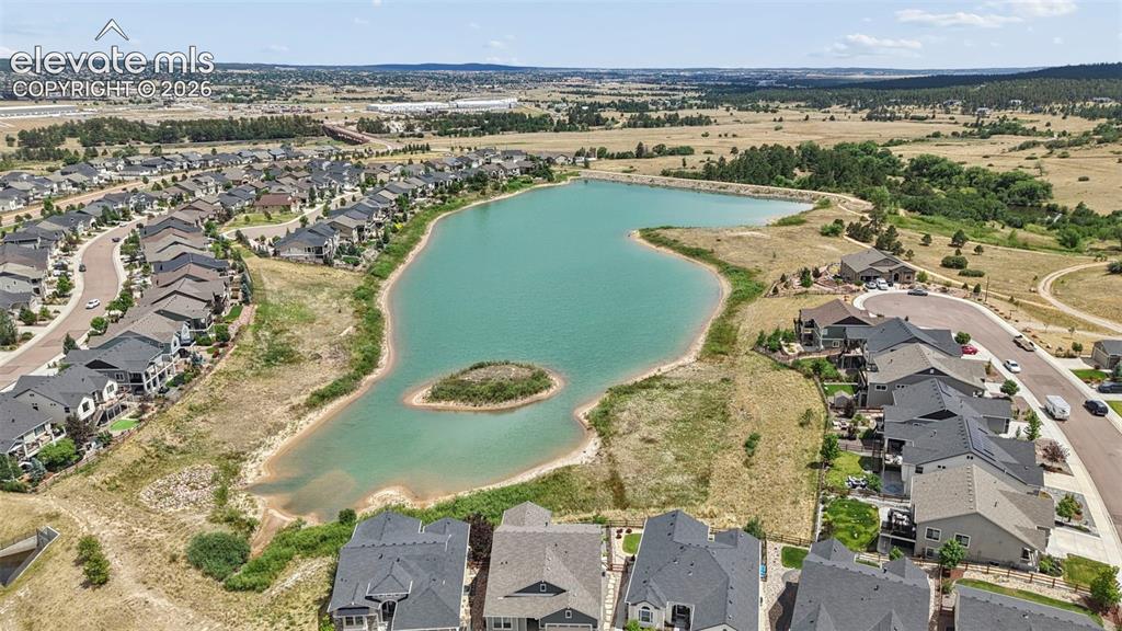 Image 34 of 37: Aerial perspective showcasing one of the two lakes in Forest Lakes