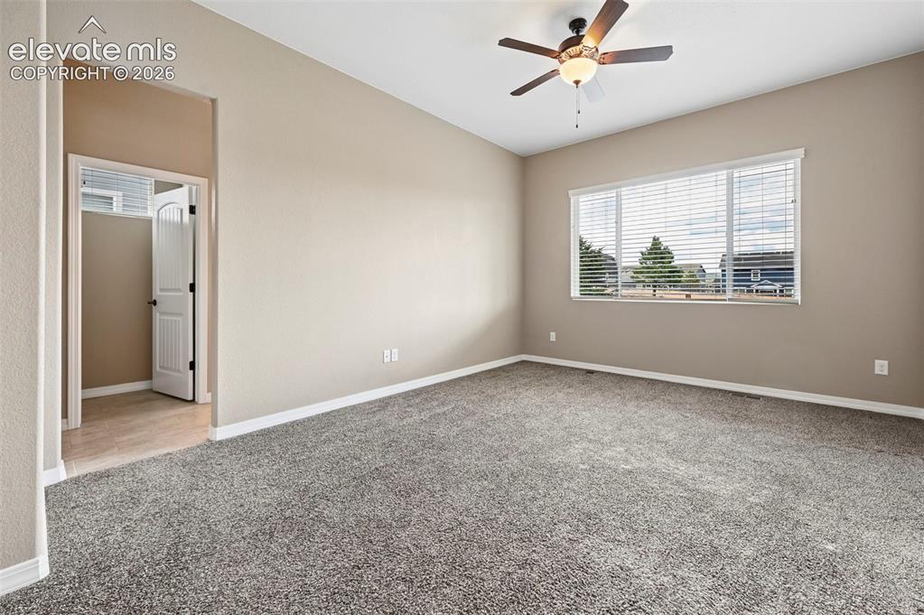 Image 9 of 37: Owners suite bedroom