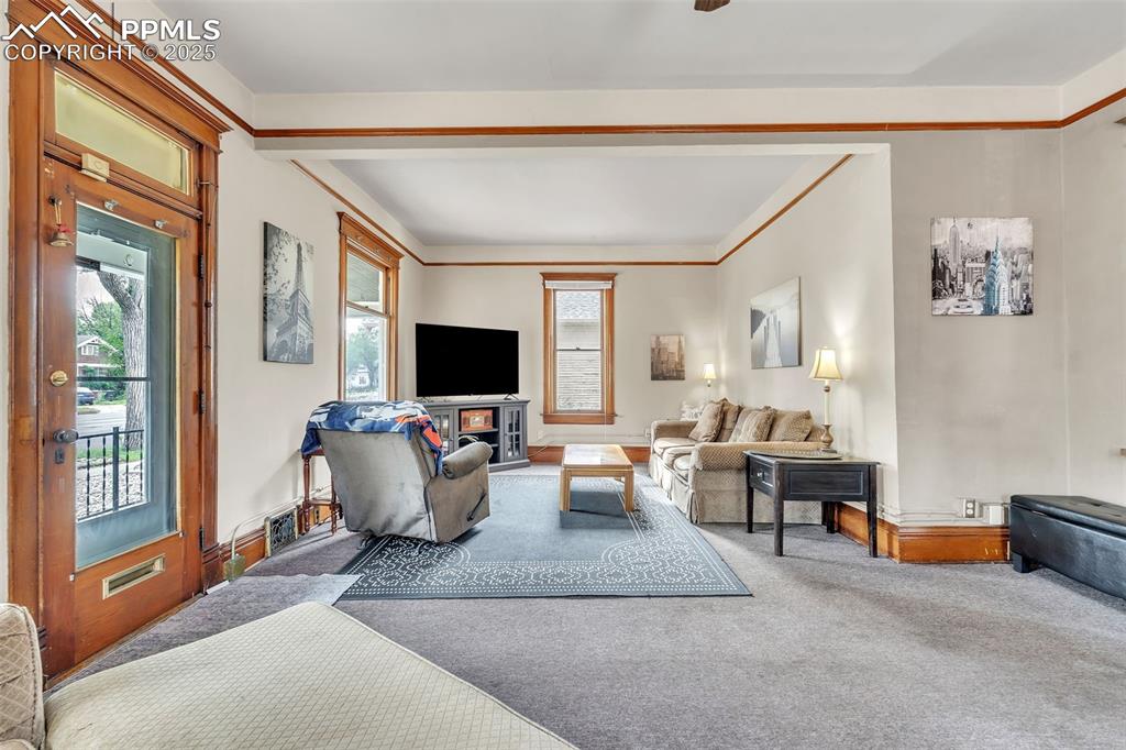 Image 10 of 49: View of carpeted living area