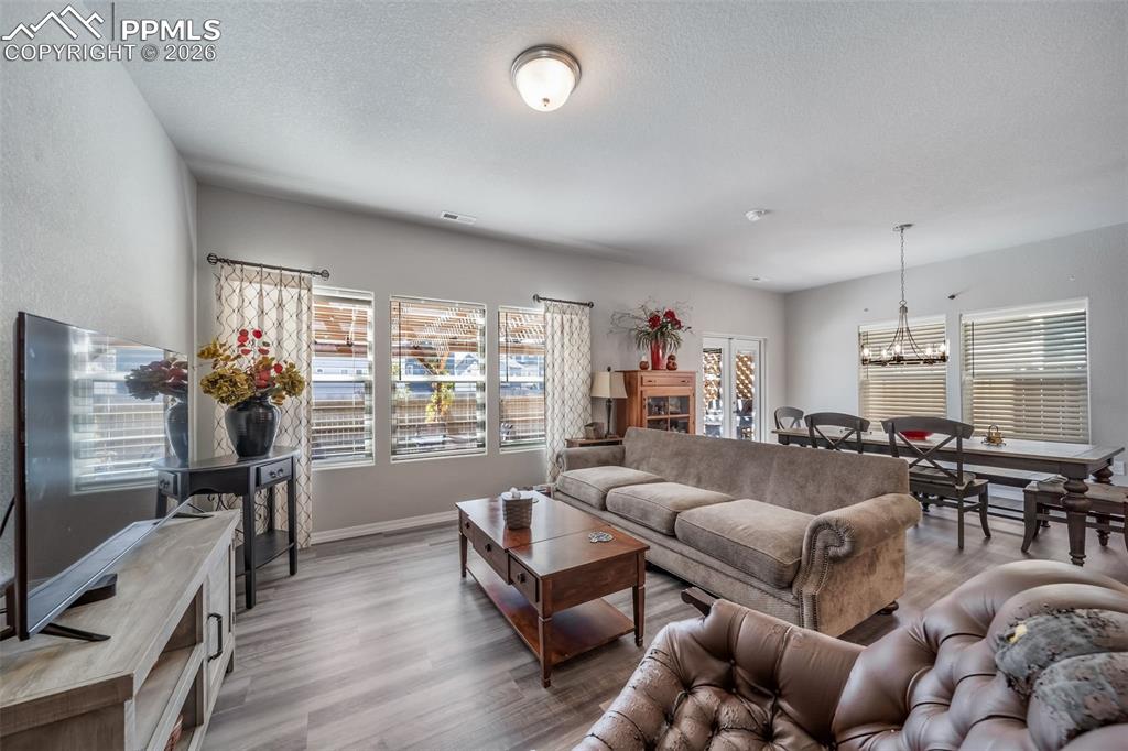 Image 13 of 45: All the window treatments and blinds are included. 