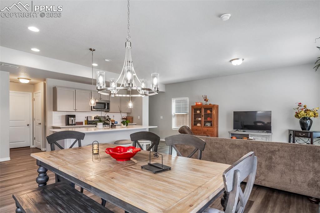 Image 20 of 45: Dining and kitchen flow seamlessly. 