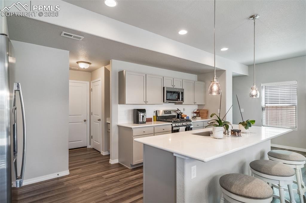 Image 7 of 45: Natural gas kitchen stove. 