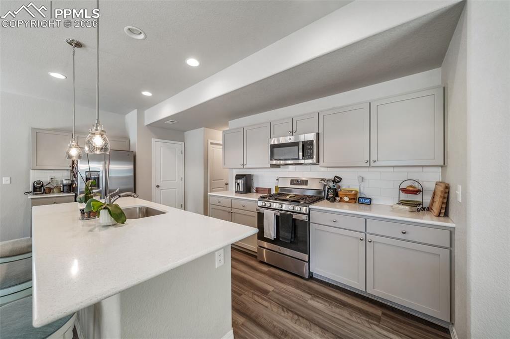 Image 9 of 45: Included stainless steel refrigerator. 