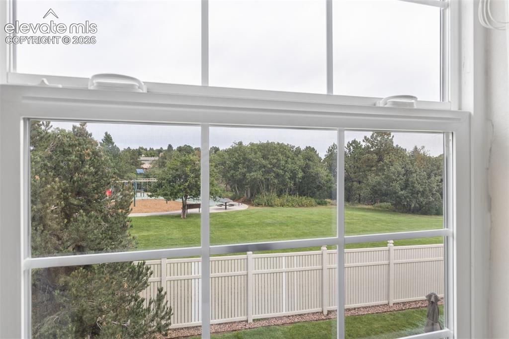 Image 18 of 37: View of Park from Primary Bedroom
