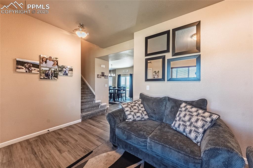 Image 5 of 33: Entry way and bonus room. Great for making an additional living space or an