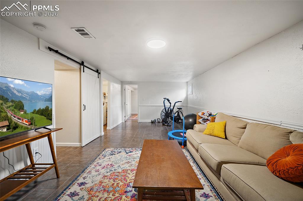 Image 23 of 49: basement living room