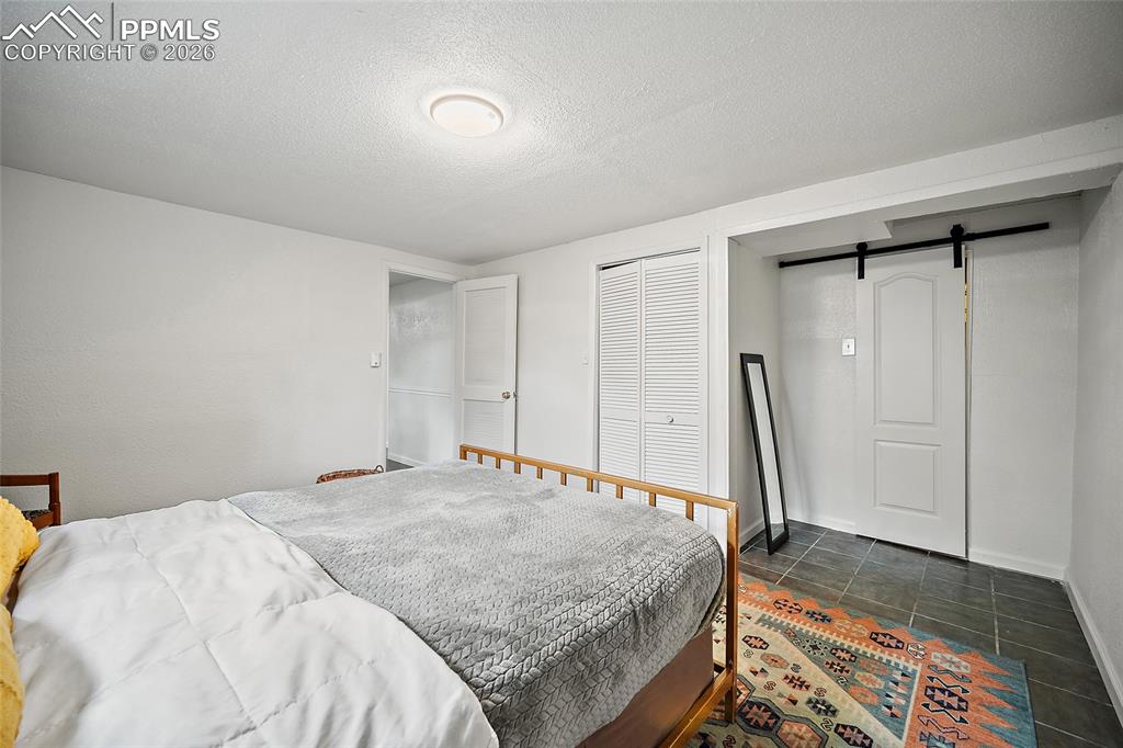 Image 28 of 49: Bedroom