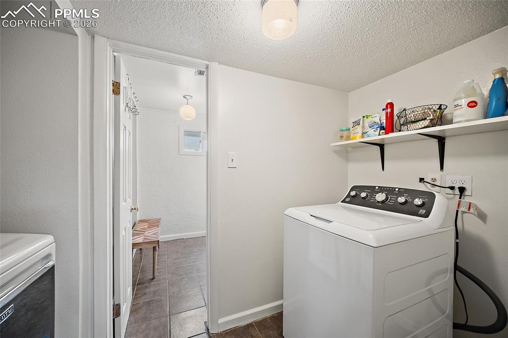 Image 29 of 49: laundry in the basement