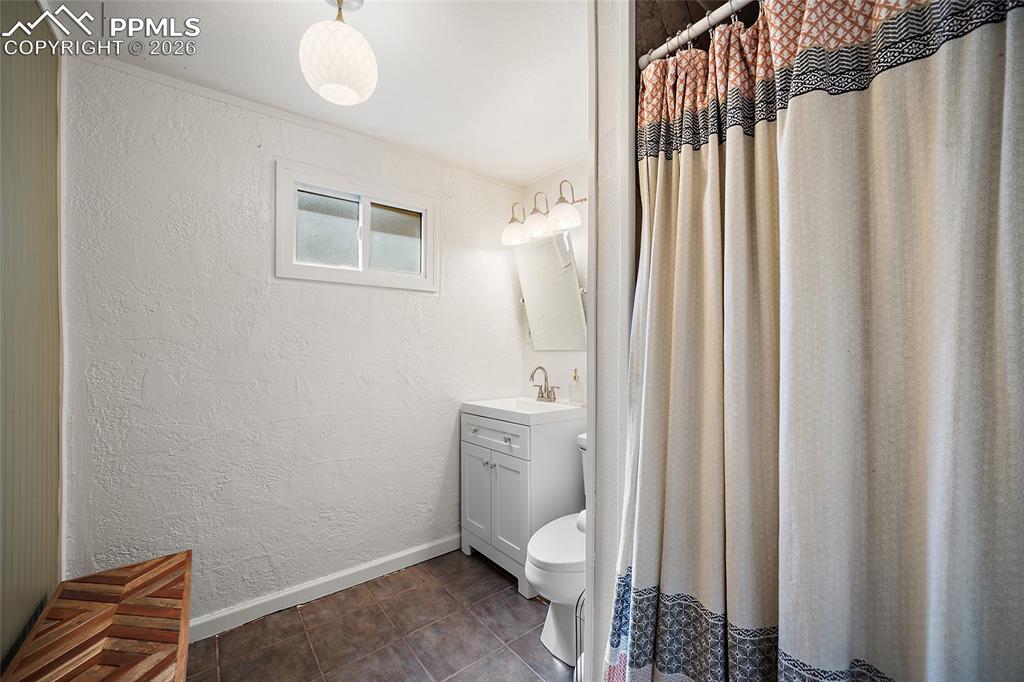 Image 30 of 49: 3/4 bathroom in the basement