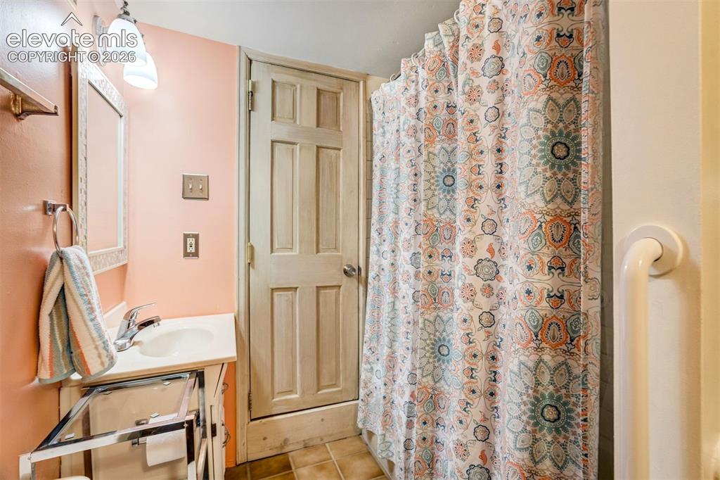 Image 17 of 30: Lower Bathroom