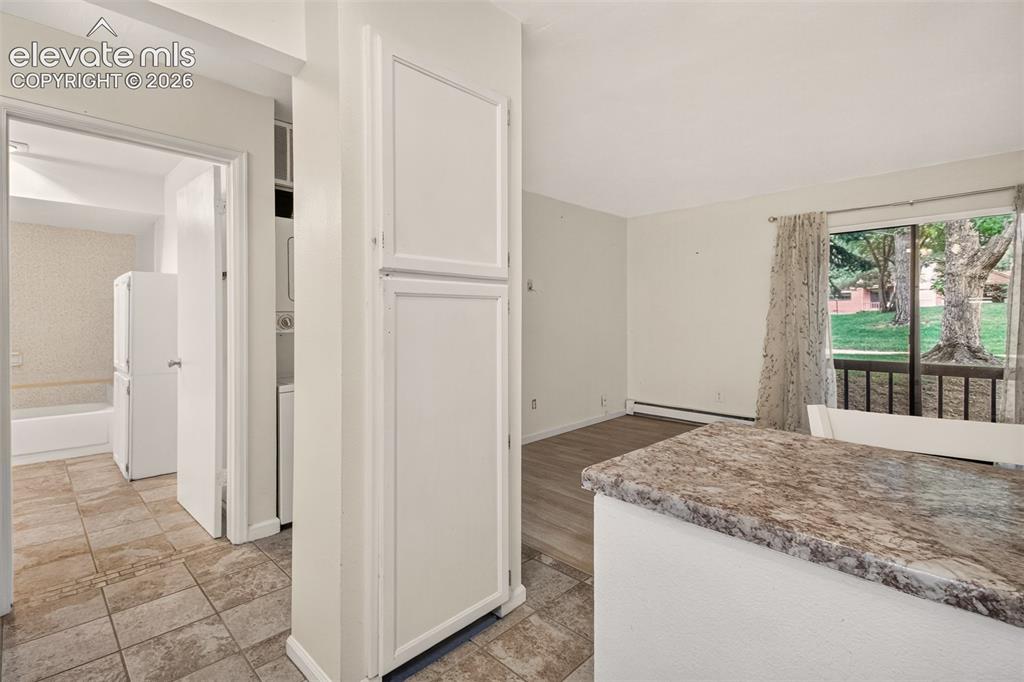 Image 5 of 17: Pantry in the kitchen and open floor plan