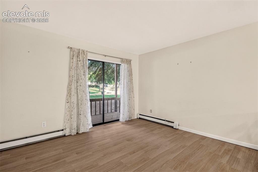 Image 7 of 17: Lovely Sliding door out to your Patio