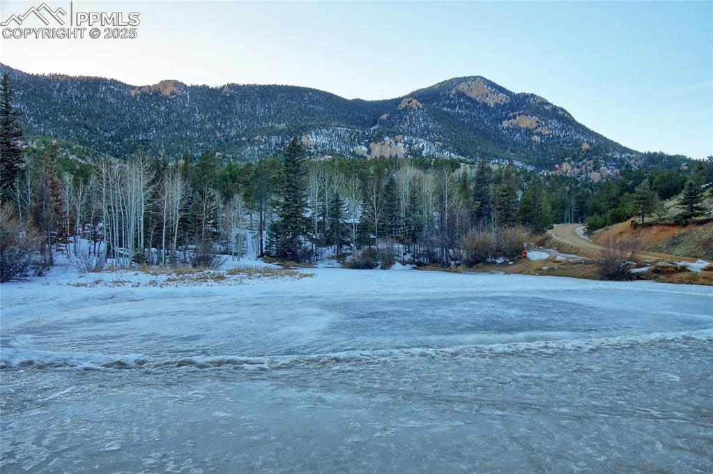 Image 32 of 33: Skating pond in the winter. Fishing pond in the summer
