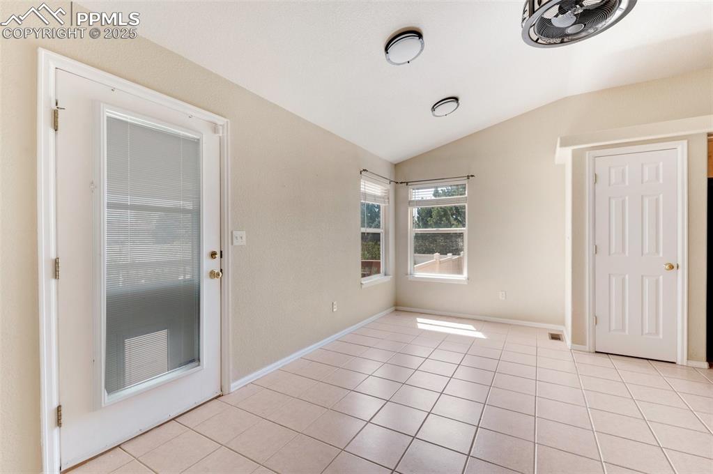 Image 15 of 43: Back Door is off the kitchen