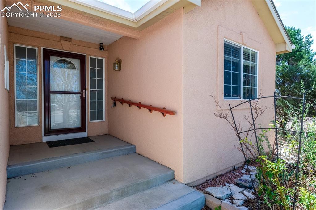 Image 2 of 43: Front entry of house