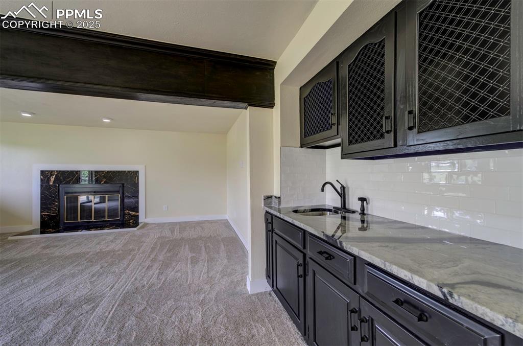Image 40 of 50: Basement Wet Bar