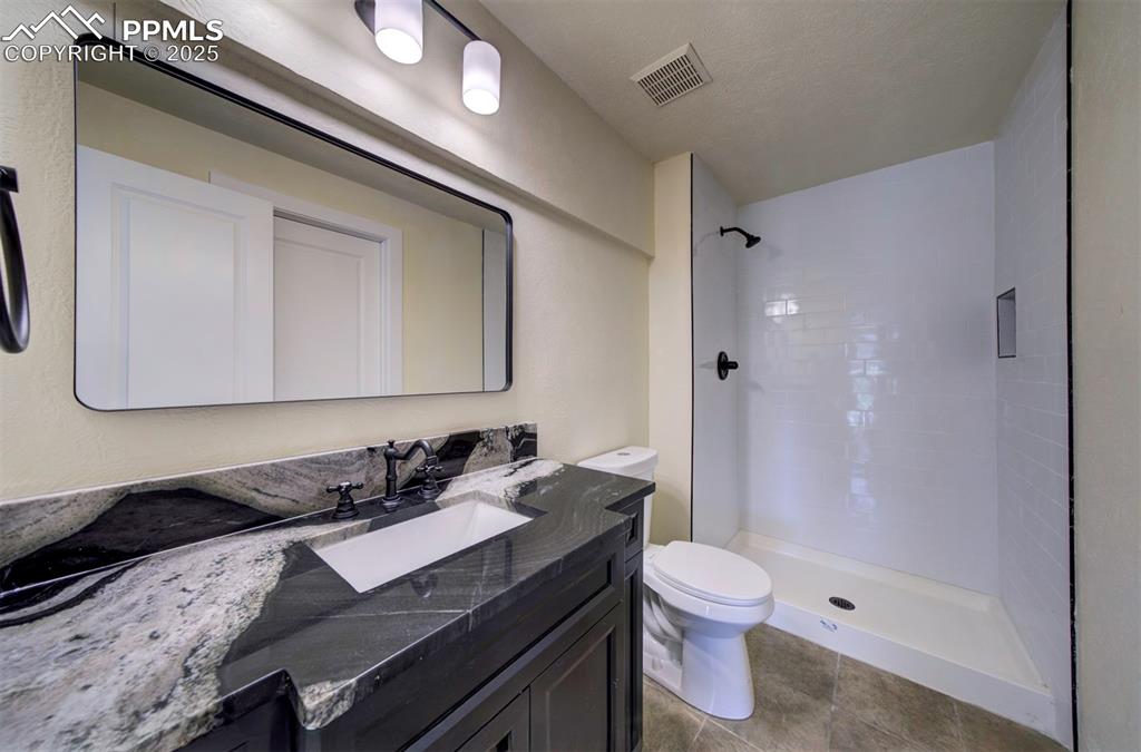 Image 43 of 50: Basement bathroom