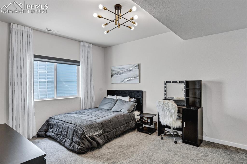 Image 40 of 50: Bedroom