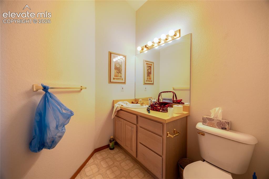 Image 14 of 26: Upstairs half bath