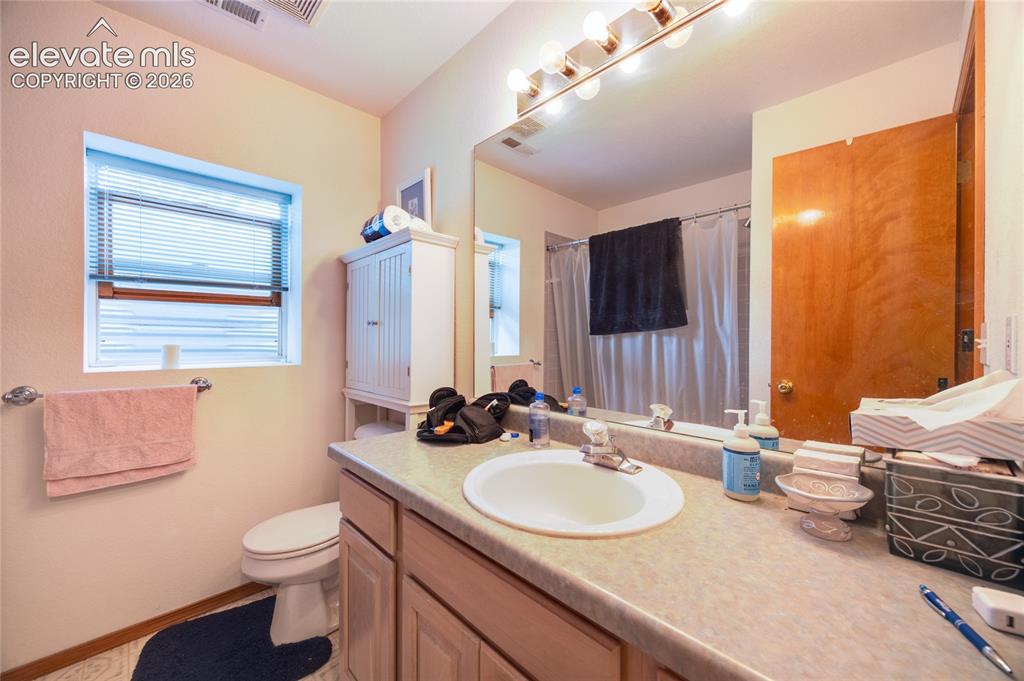 Image 17 of 26: Lower level main bath