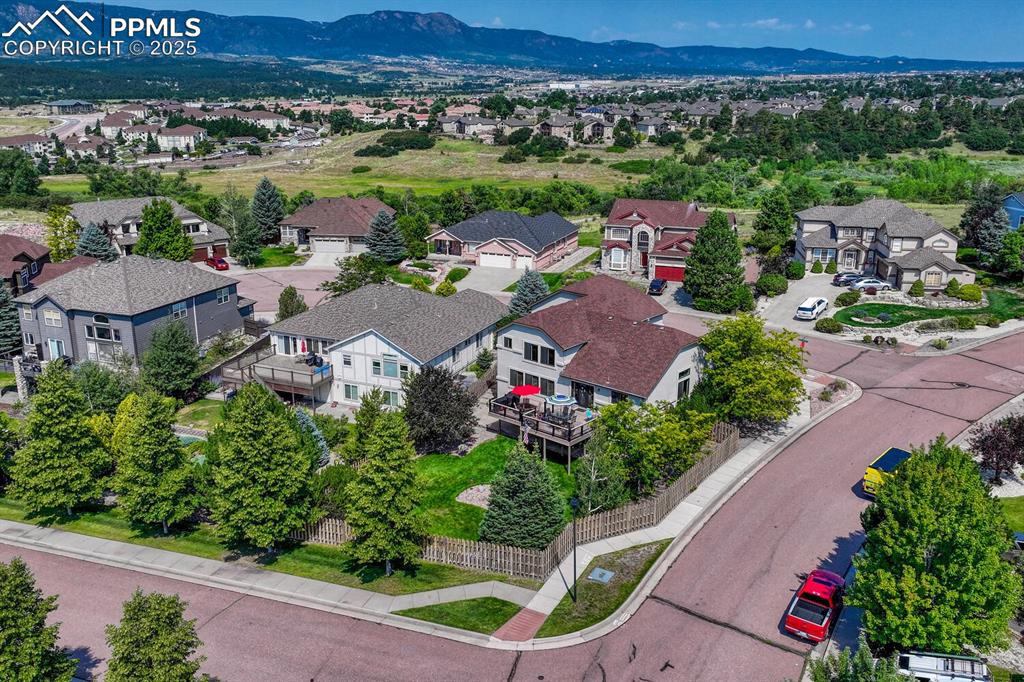 Image 50 of 50: Aerial view of residential area with mountains