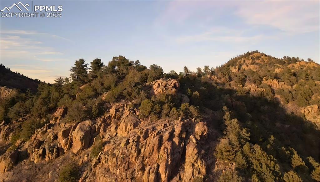 Image 11 of 16: View of mountain backdrop featuring