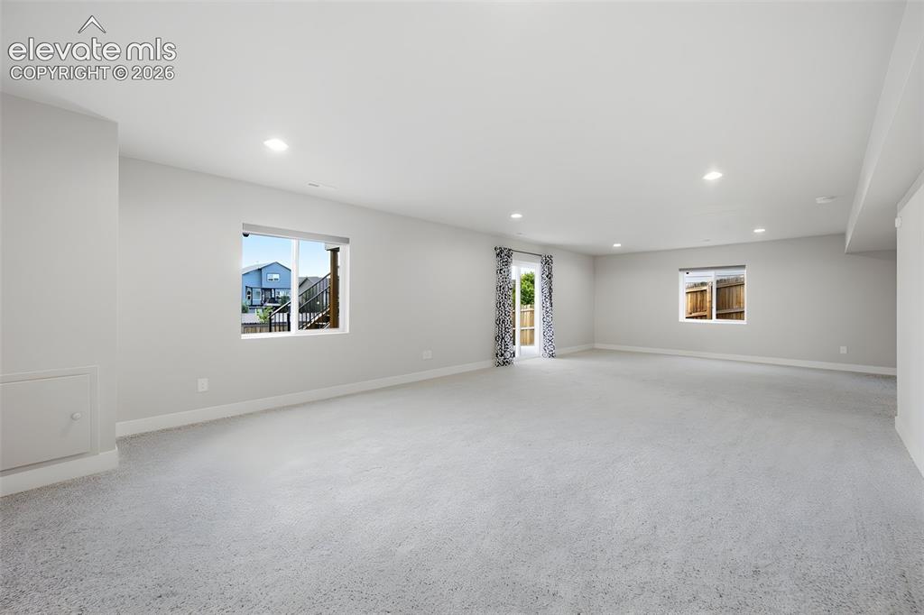 Image 50 of 50: Rec Room- basement (cont)