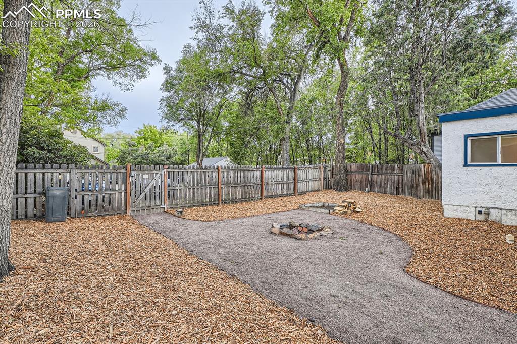 Image 26 of 28: Backyard- Off Street Parking