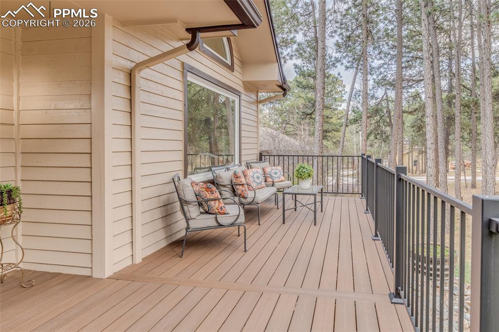 Image 10 of 50: Enjoy sitting on the front deck with the composite deck