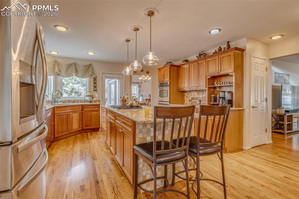 Image 18 of 50: Island with seating