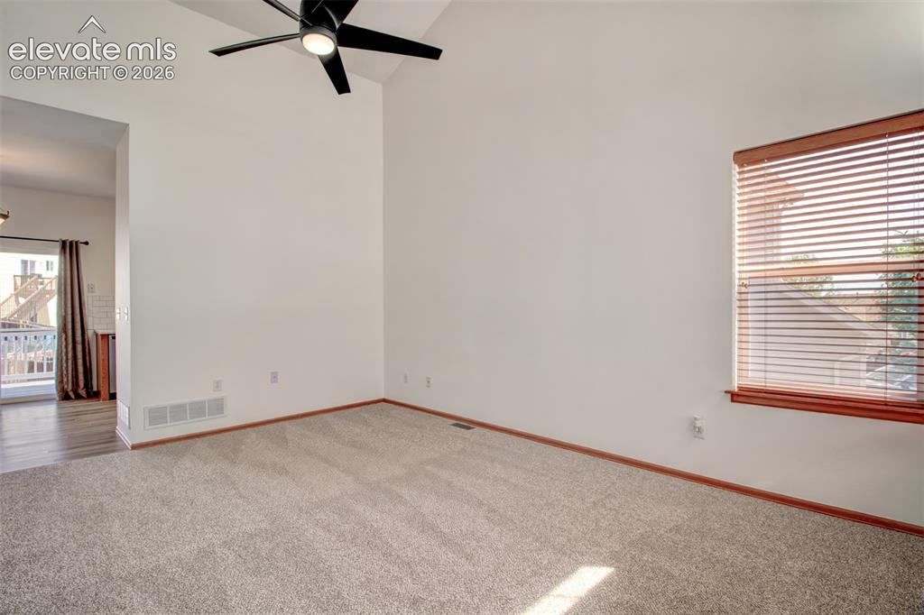 Image 3 of 37: Living room showing window to the right.