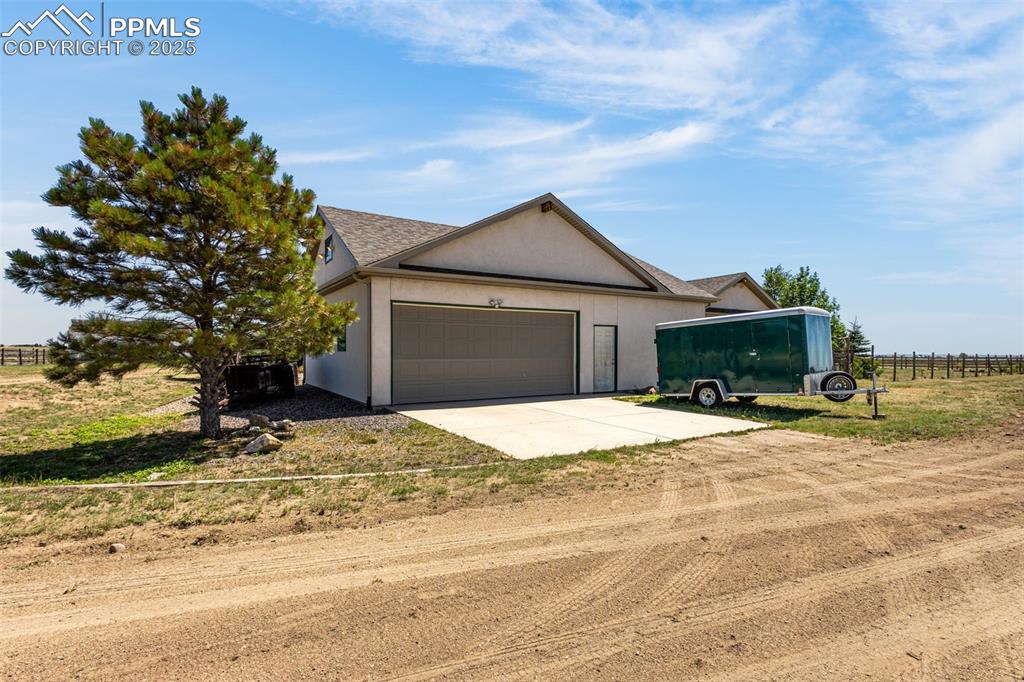 Image 39 of 50: Oversized 2-car garage.