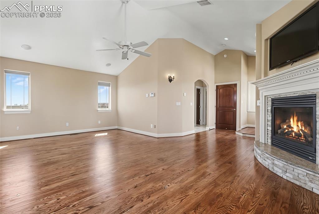 Image 22 of 50: Primary Bedroom w/Fireplace, Balcony and 5-Piece Walk-in Bath