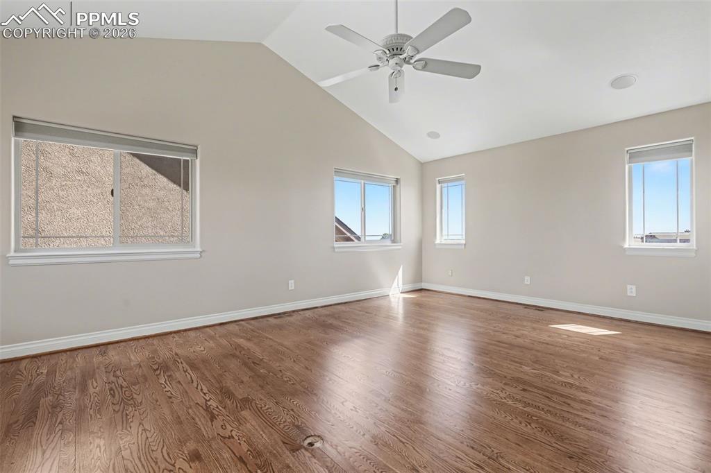 Image 23 of 50: Primary Bedroom w/Fireplace, Balcony and 5-Piece Walk-in Bath