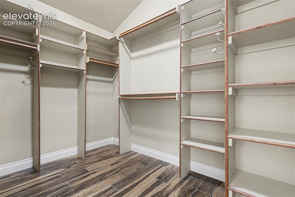 Image 27 of 50: Primary Large Walk-In Closet