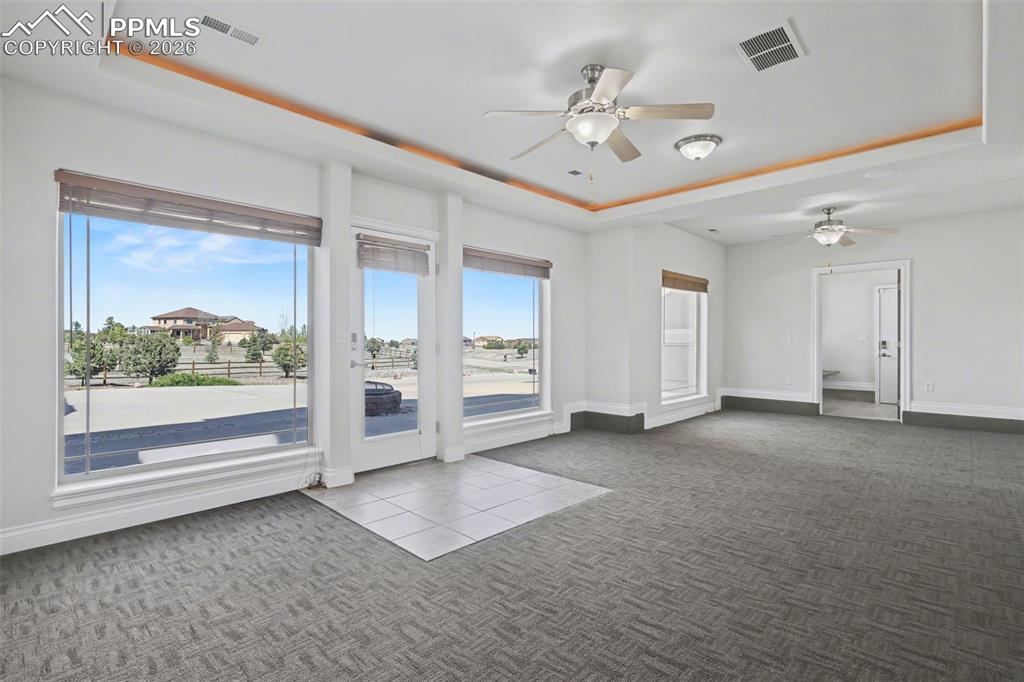 Image 28 of 50: Walk-Out Rec Room to Firepit