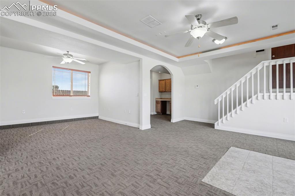 Image 30 of 50: Walk-Out Rec Room to Firepit