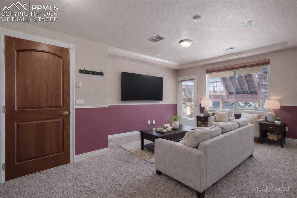 Image 37 of 50: Virtually Staged - Guest Living Room Area with Separate Exterior Entrance