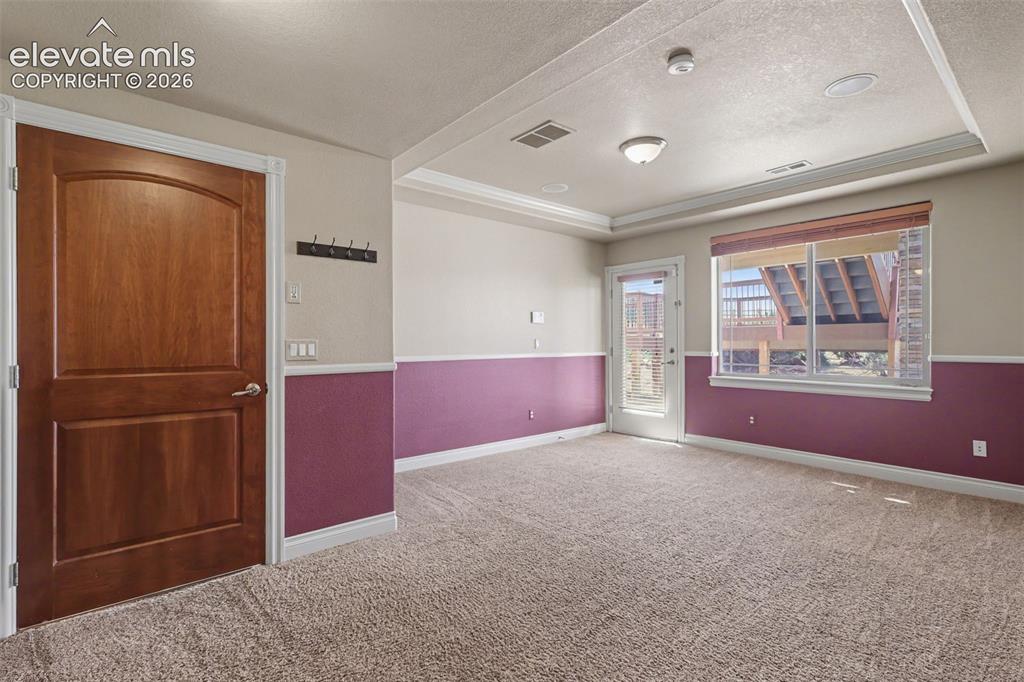 Image 38 of 50: Guest Living Room Area with Separate Exterior Entrance