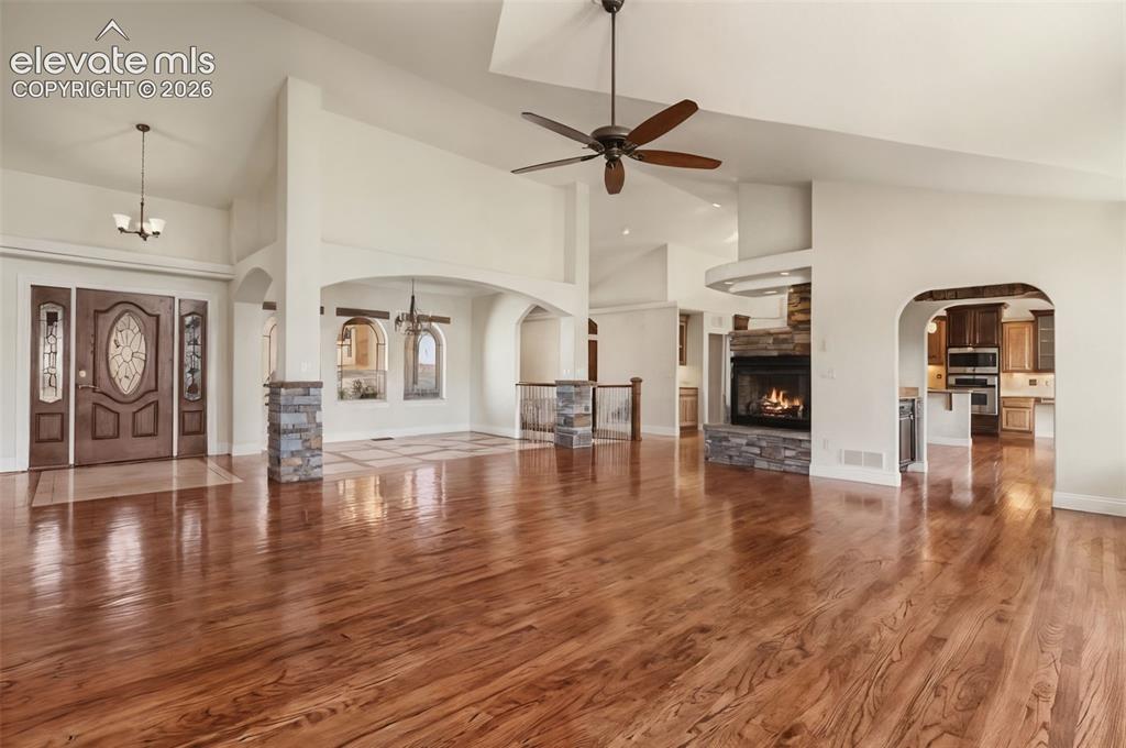 Image 8 of 50: Stunning Great Room, Vaulted Ceilings, Solid Wood Floors, Windows of Natura