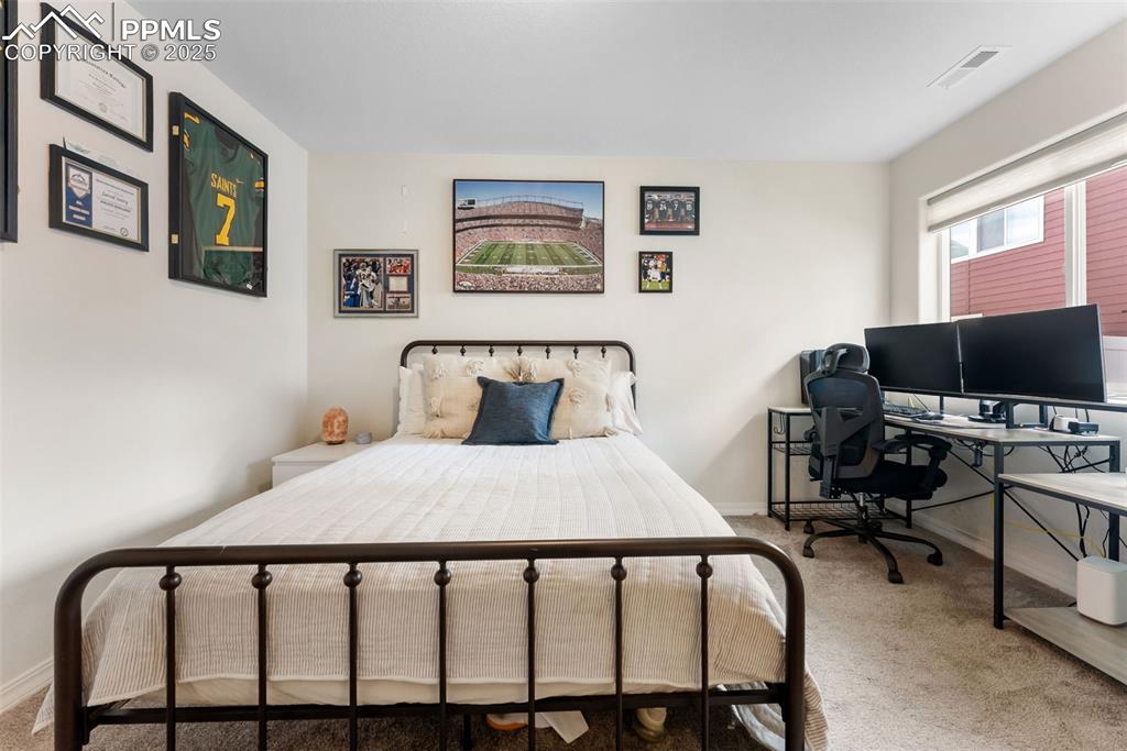 Image 24 of 39: Bedroom