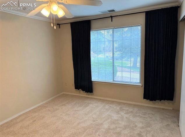 Image 19 of 32: Another view of the main bedroom featuring large window with window coverin