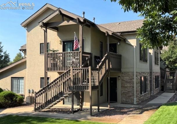 Image 2 of 32: View of property showing entry door - it is the Lower Unit.