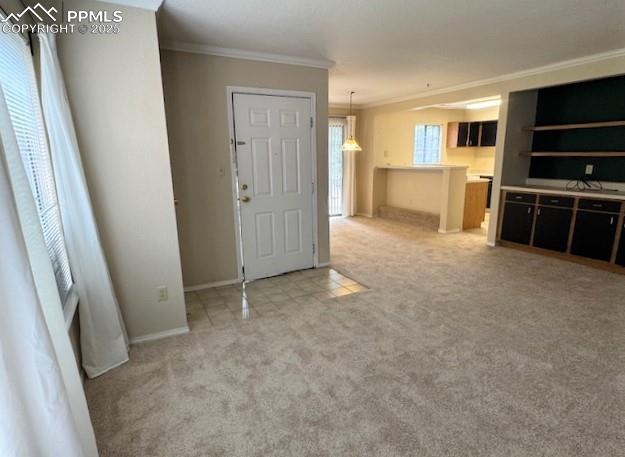Image 5 of 32: Living room view looking towards dining room and kitchen showing new carpet