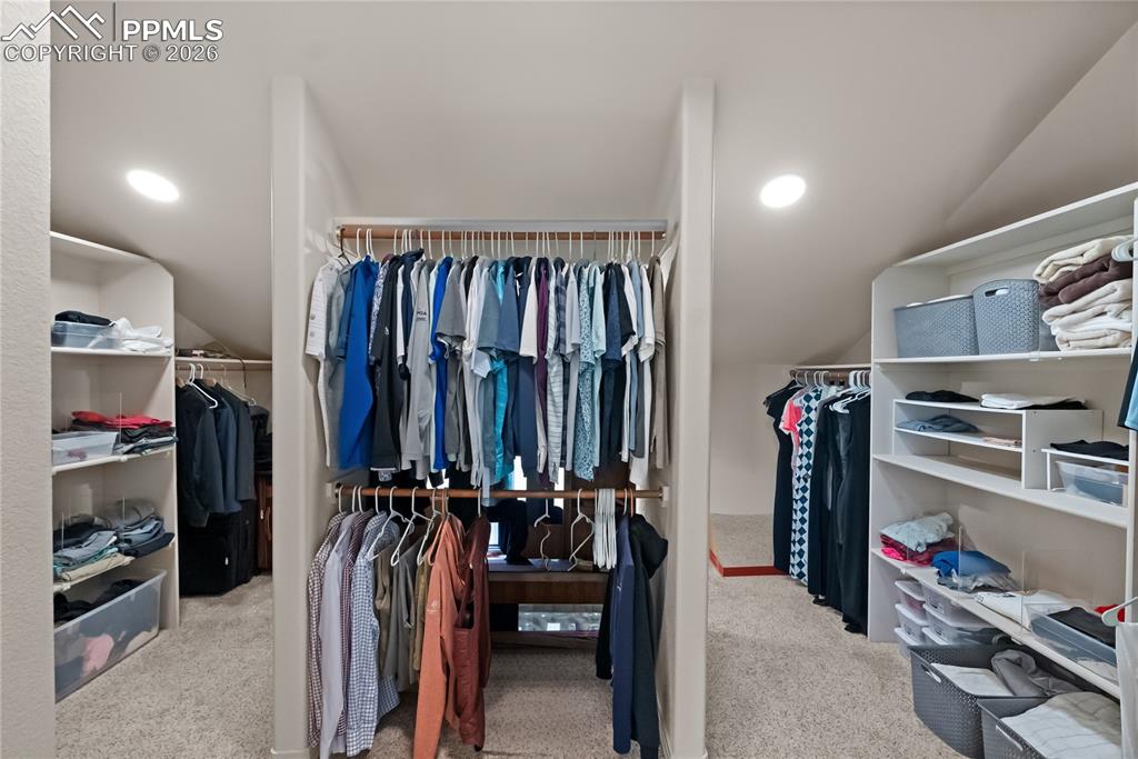 Image 22 of 40: Primary walk in closet.